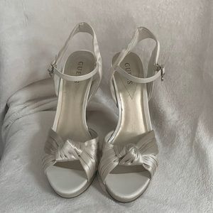 White Satin Strappy Platform Heels with “G” letter detailing on buckle